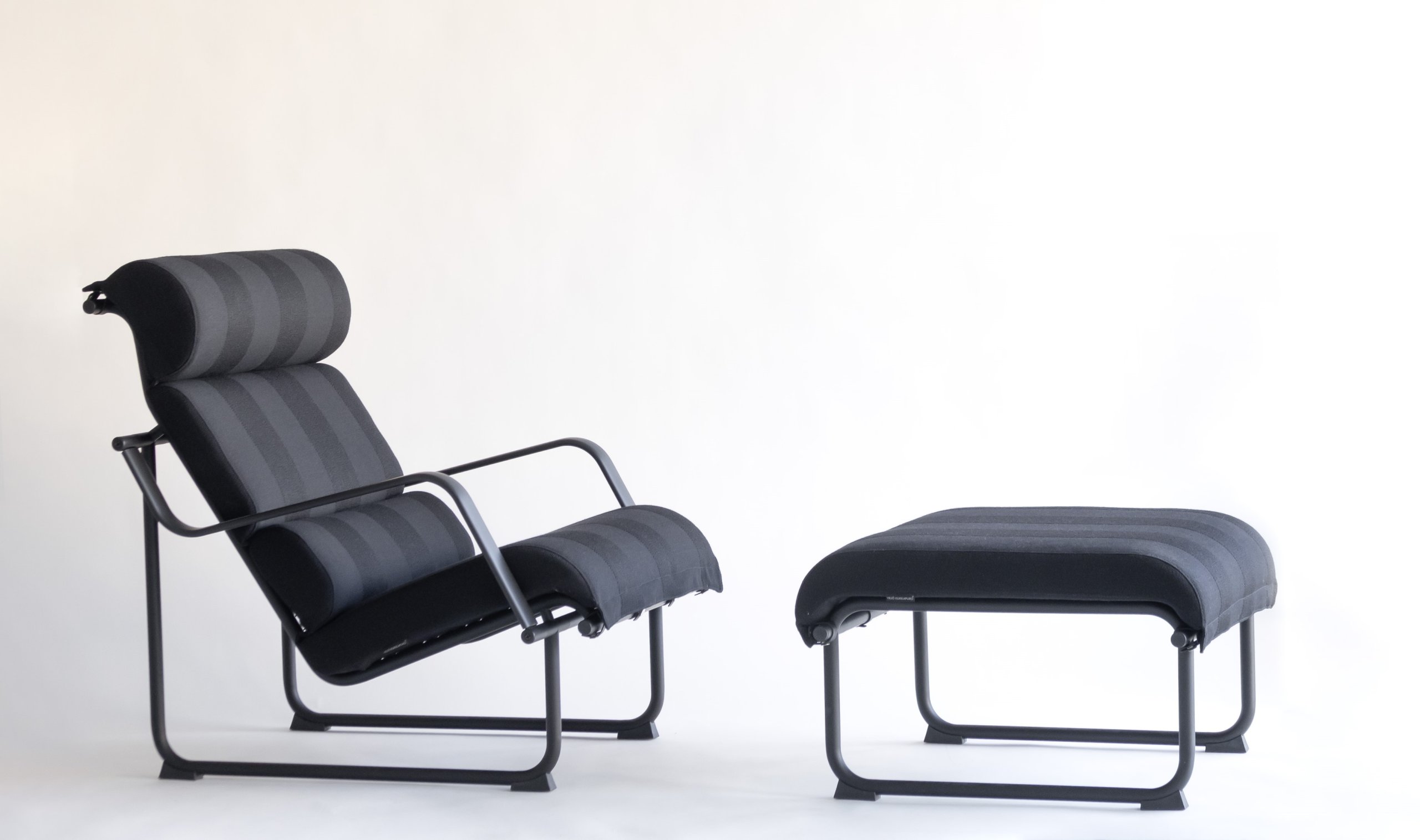 Remmi lounge chair and ottoman, Kvadrat Raf Simons Reflex upholstery